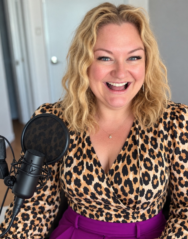 Nyree Rochaix, founder of My Ultimate Hens, laughing in front of a podcast microphone