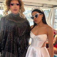 A drag performer and a bride to be on a My Ultimate Hens boat cruise