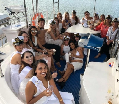 Photo sent in with this review: Champers Sunset Cruise with Topless Waiter