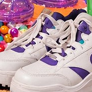 Chunky white platform sneakers with purple and teal panels