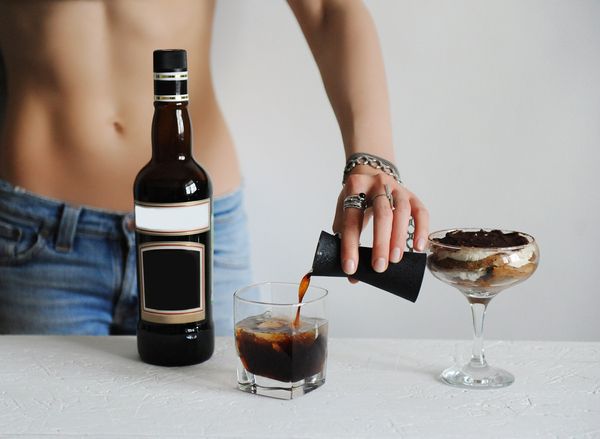 topless waiter serving drinks to lovely hens party guests