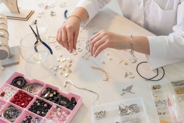 A gorgeous hen chooses beads to use during the statement earring workshop