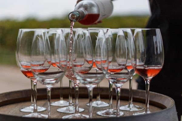 Wine being delicately poured for a delicious tasting