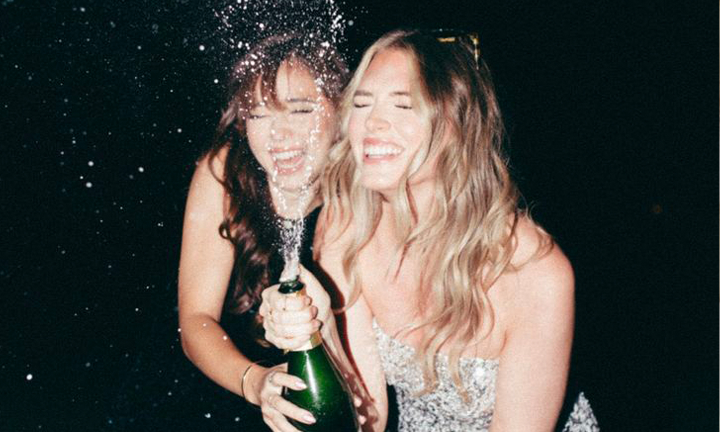 Friends celebrating with champagne